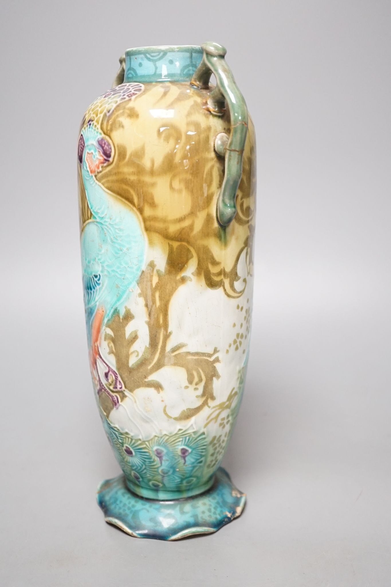 An Art Nouveau/Secessionist style Mintons ‘peacock’ vase (a.f.) 29cm